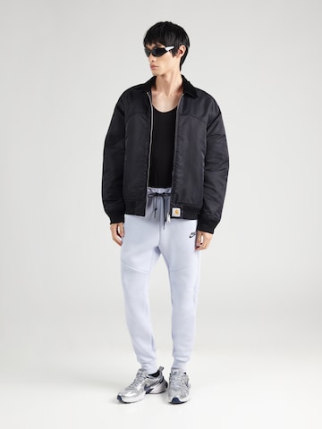 Nike Sportswear - Tapered Calças 'TCH FLC' em azul
