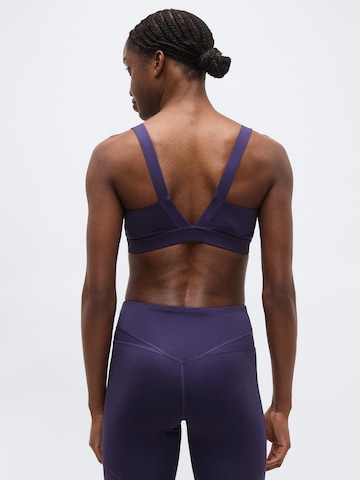 PUMABustier Sportski grudnjak 'PWRSHAPE SHINE' - ljubičasta boja