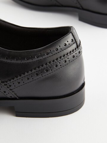 Chaussure à lacets Next en noir