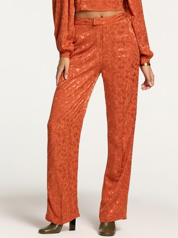 Shiwi Loose fit Pants in Orange: front