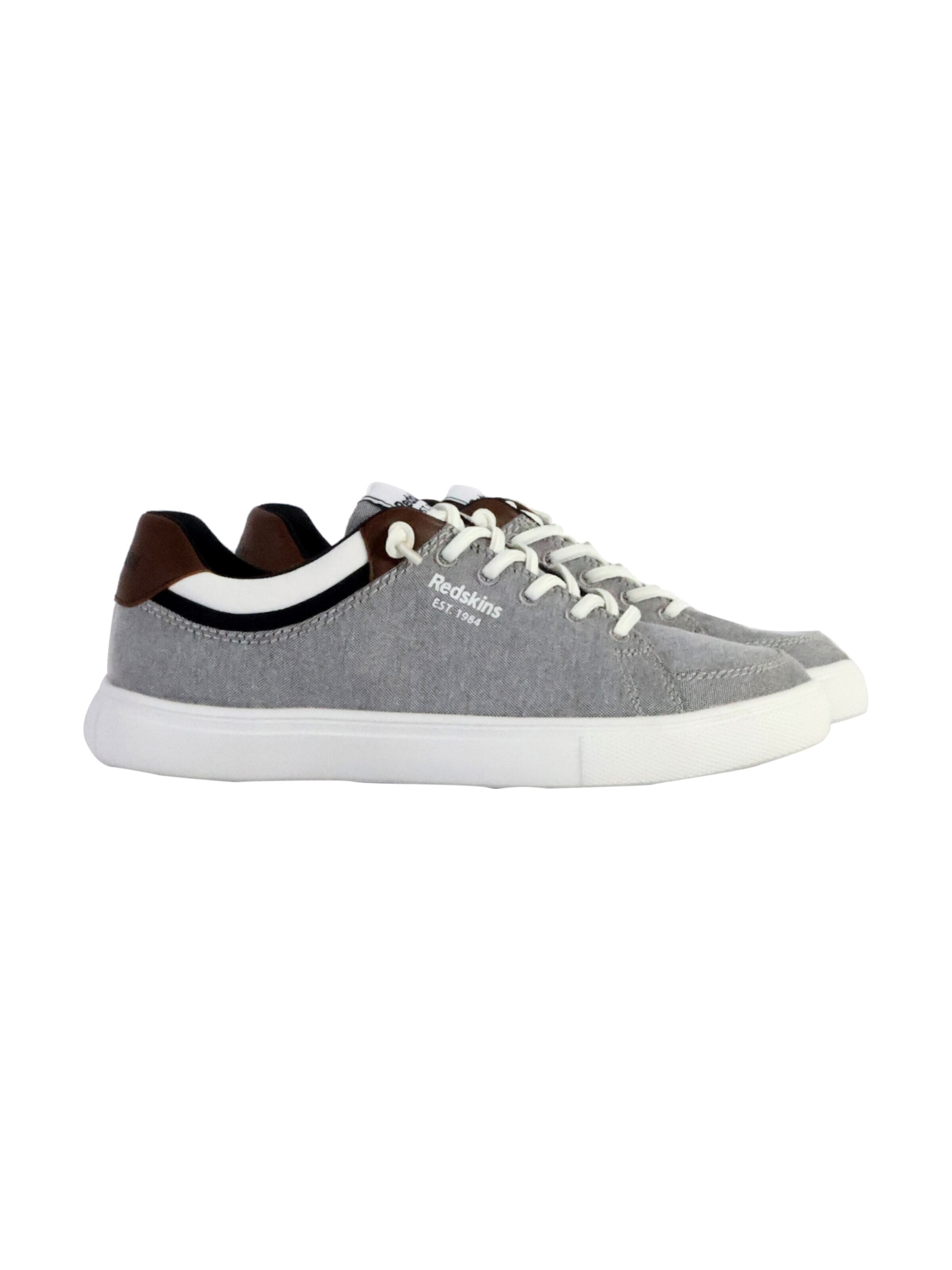 Chaussure de sport à lacets PUMA en gris
