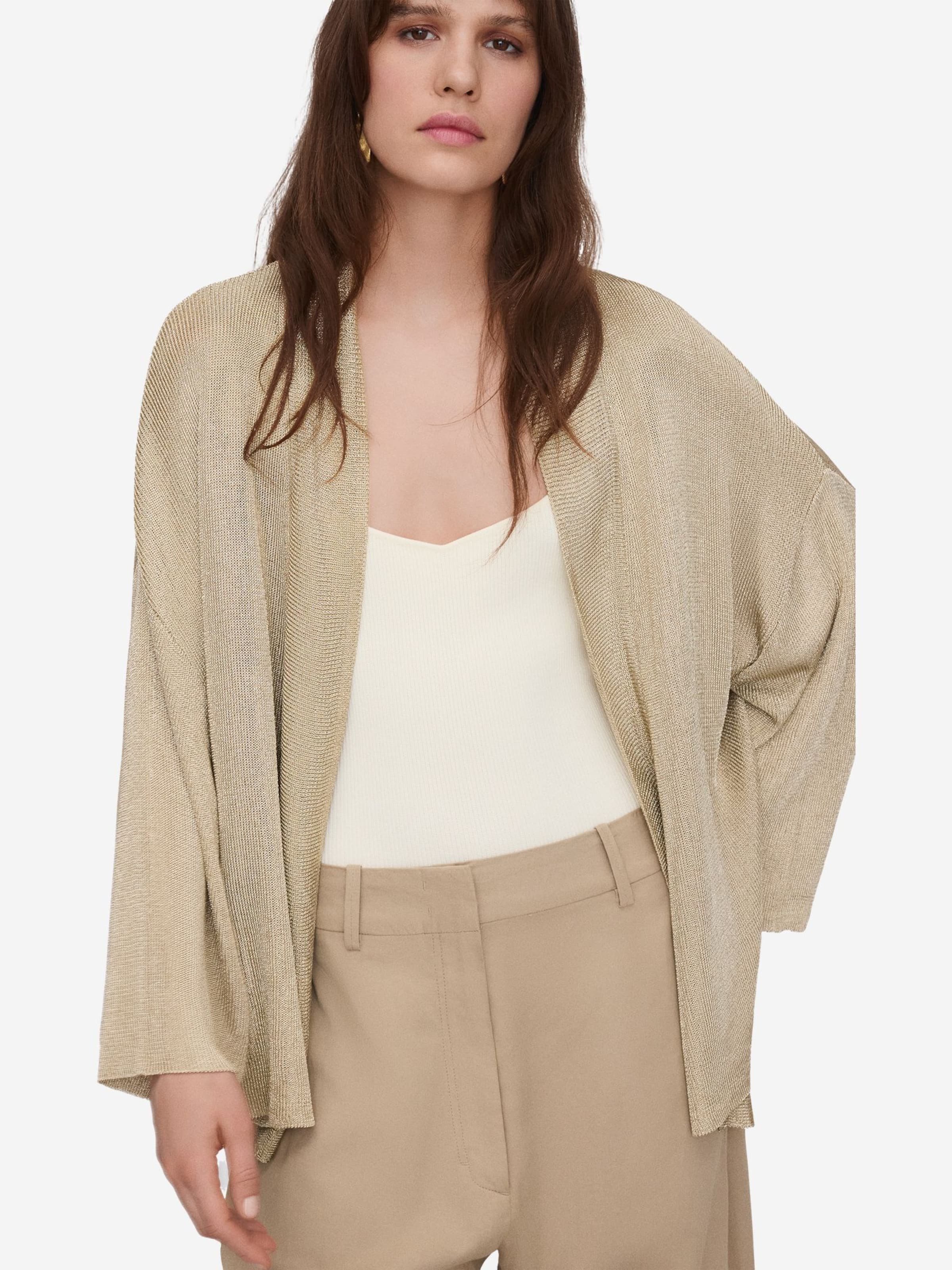 Adolfo Dominguez Kofta i guld: framsida