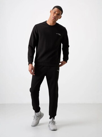 Tommy Life Joggingpak in Zwart