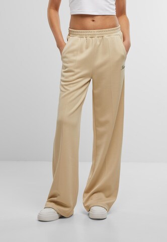 Karl Kani Wide leg Broek in Beige: voorkant