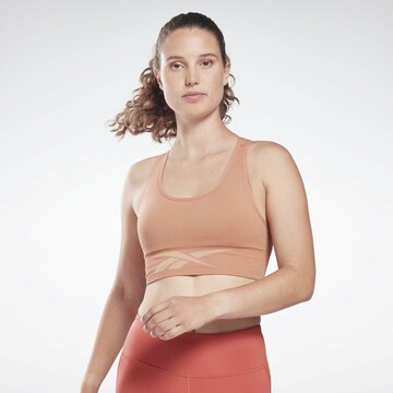 Bustino Reggiseno sportivo 'Workout Ready' di Reebok in rosa: frontale