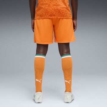 PUMA Regular Workout Pants in Orange