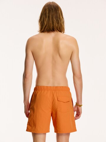 Shiwi Plavecké šortky 'NICK' – oranžová