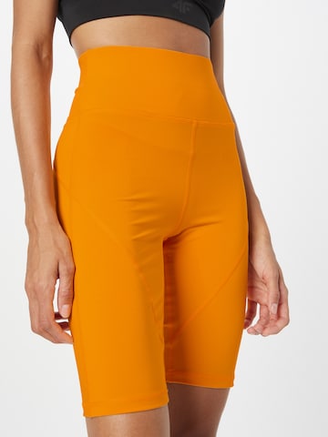 ONLY PLAY Skinny Workout Pants in Orange