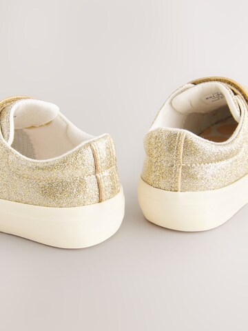 Baskets Next en or