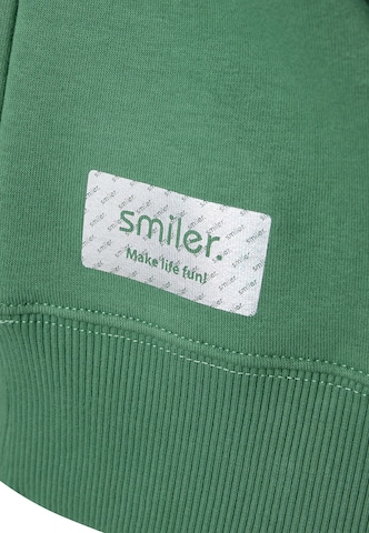 Pull-over 'Cuddle' smiler. en vert