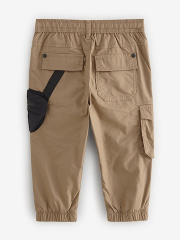 Next Tapered Hose in Braun