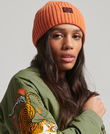 Bonnet Superdry en orange : devant