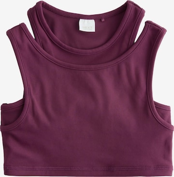 Next Urheilutoppi värissä punainen: etupuoli