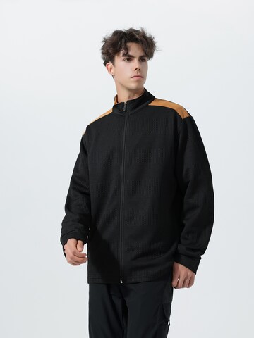 Youthup Sportstrickjacke in Schwarz: Vorderseite