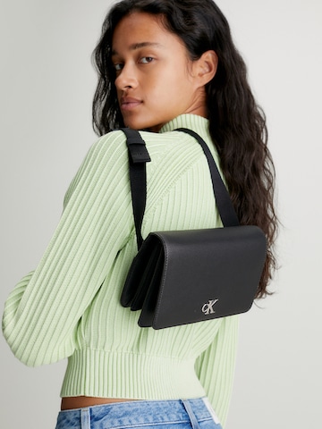 Calvin Klein Jeans - Bolsa de cintura em preto