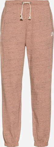 Nike Sportswear Tapered Pants in Pink: front