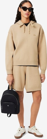 LACOSTE Käsilaukku 'Lacoste Sac à dos Femme Daily City Noir' värissä musta