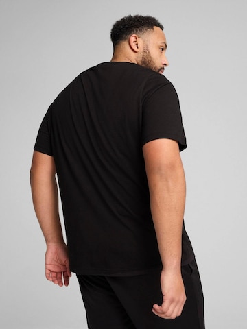 PUMA Shirt 'Puma Ess No. 1 Logo Tee' in Zwart