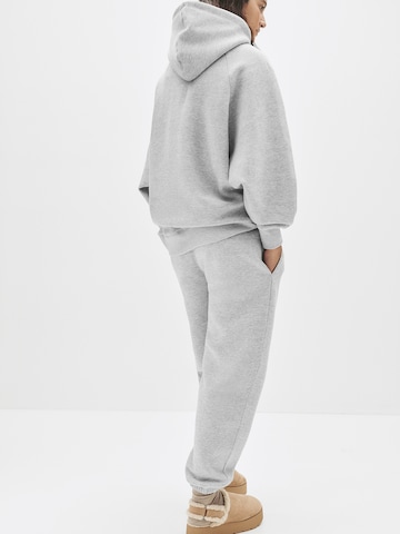 Tapered Pantaloni di Pull&Bear in grigio