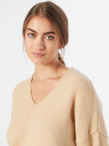 Pull-over BOSS Orange en beige