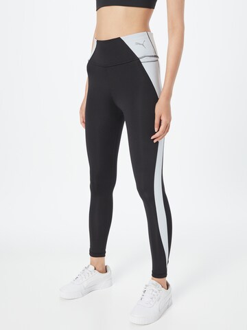 PUMA Skinny Workout Pants in Black: front