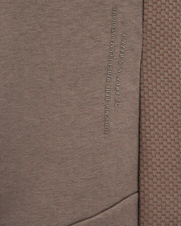 WE Fashion Tapered Trousers in Brown