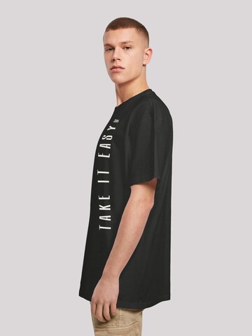 T-Shirt 'Take It Easy' F4NT4STIC en noir