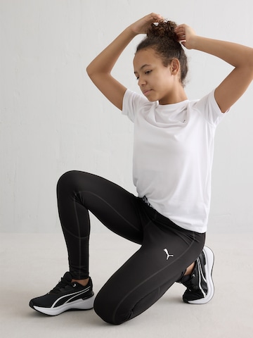 PUMA Skinny Sportbyxa 'Strong' i svart