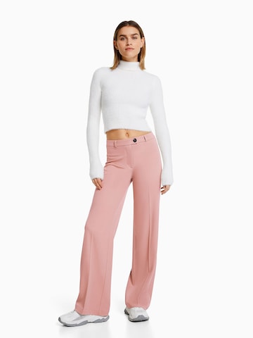 Bershka Wide leg Pressveckad byxa i rosa