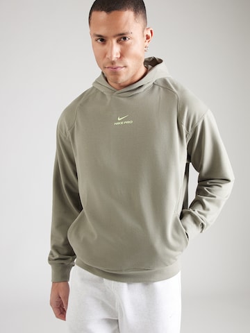 NIKE - Camiseta deportiva 'NPT' en verde: frente