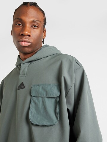 ADIDAS SPORTSWEAR - Sweatshirt de desporto em verde