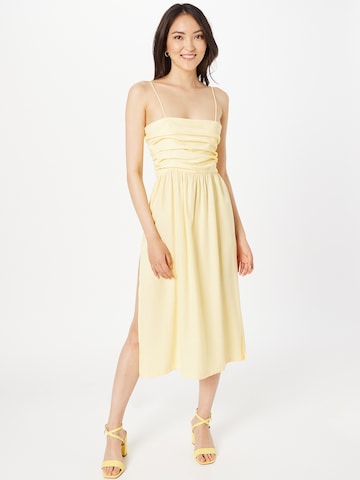 The Frolic Summer Dress in Yellow: front