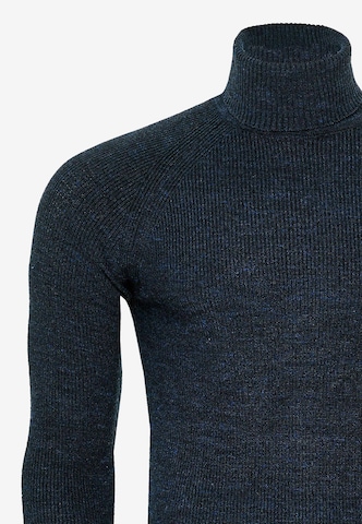 Rusty Neal Pullover mit stilvollem Rollkragen in Blau