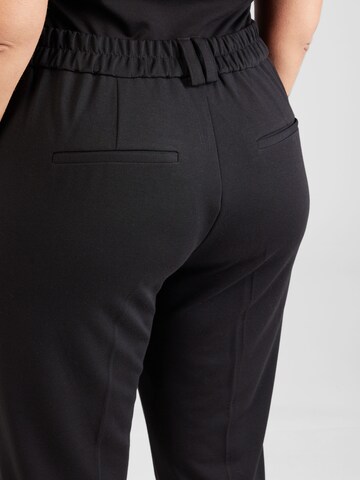regular Pantaloni con piega frontale 'PEACH' di ONLY Carmakoma in nero