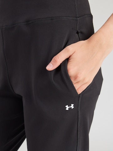 UNDER ARMOUR - Tapered Pantalón deportivo 'Motion' en negro