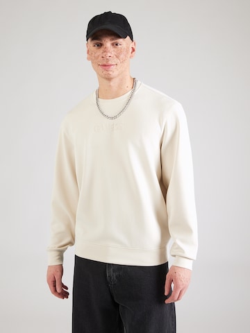 GUESS Μπλούζα φούτερ σε μπεζ: μπροστά