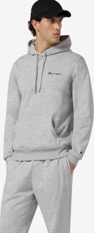 Sweat-shirt 'Sudadera champion gris small embroidered logo hoodie' Champion -DO NOT USE- en gris : devant