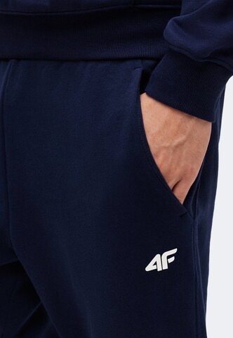 Tapered Pantaloni sport de la 4F pe albastru: față