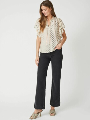 Chemisier 'Dionne' co'couture en beige