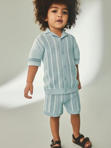 Set Next en bleu