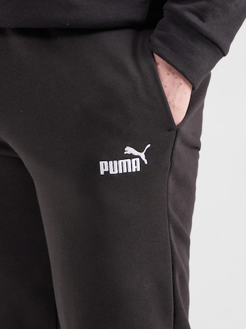 PUMA Конический (Tapered) Спортивные штаны 'Ess No. 1' в Черный