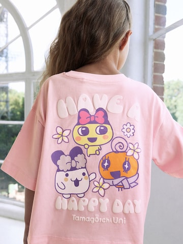 Tricou 'Tamagotchi' de la Next pe roz: față