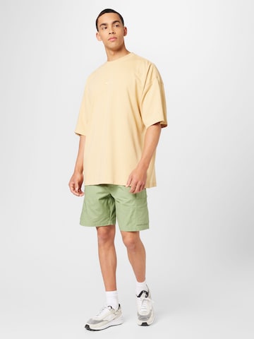 Nike Sportswear - Loosefit Calças cargo em verde