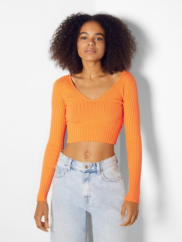 Bershka Sweter w kolorze pomarańczowy: przód