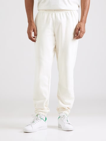 ELLESSE Конический (Tapered) Штаны 'Pideura' в Белый: спереди