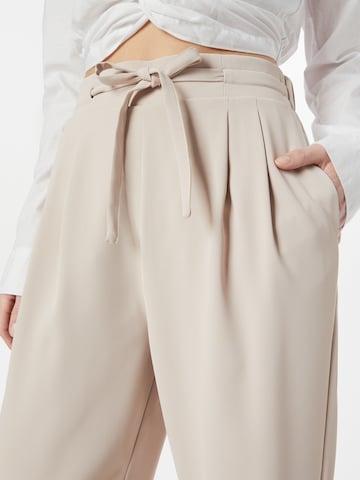 ABOUT YOU Loose fit Pleat-front trousers 'Nicole' in Beige