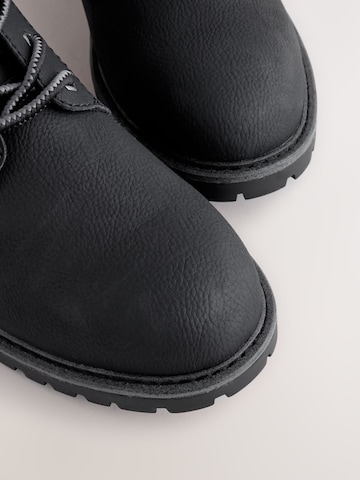 Boots stringati di Next in nero