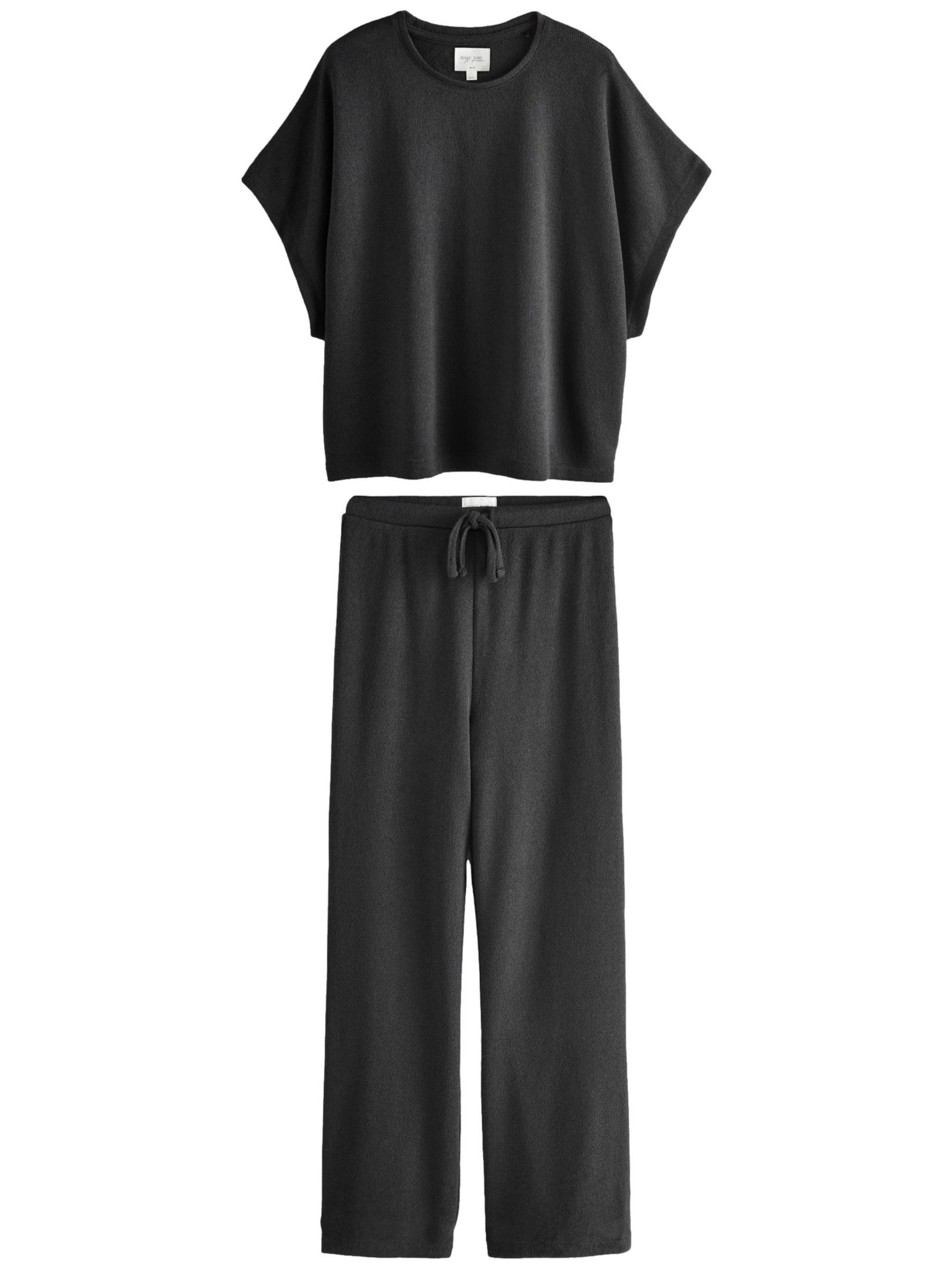 Next Pyjama in Zwart: voorkant