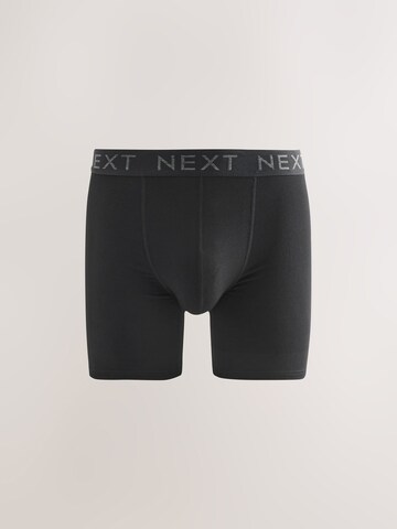 Boxeri de la Next pe negru