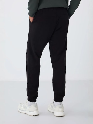 Tapered Pantaloni di Tommy Life in nero